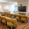 a theater area with yellow chairs