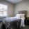 Bedroom with natural lighting and high ceilings