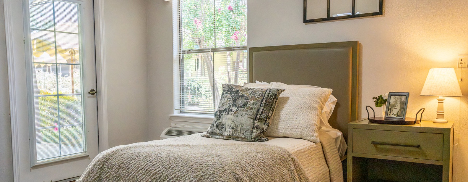 Bedroom with natural lighting and high ceilings