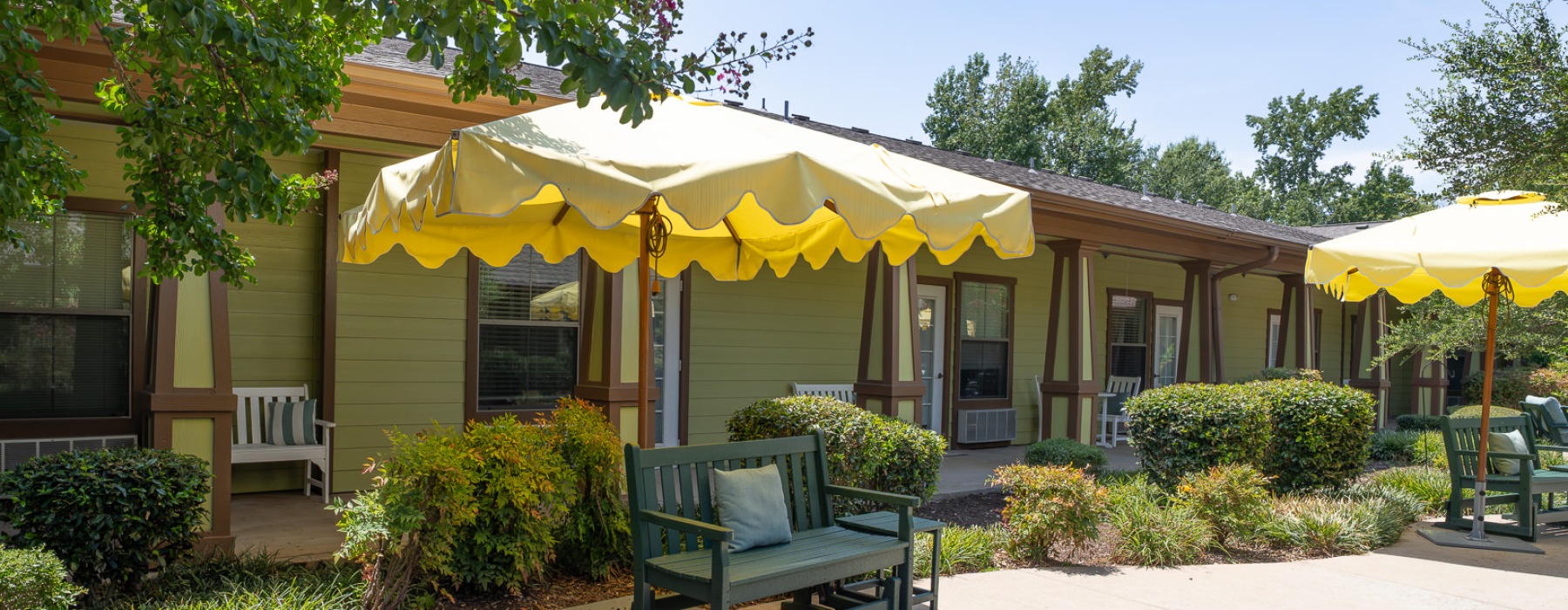 an umbrella over a bench