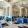a spacious dining room with blue chairs