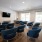 a small theater with lounge chairs
