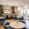 a dining hall with blue chairs