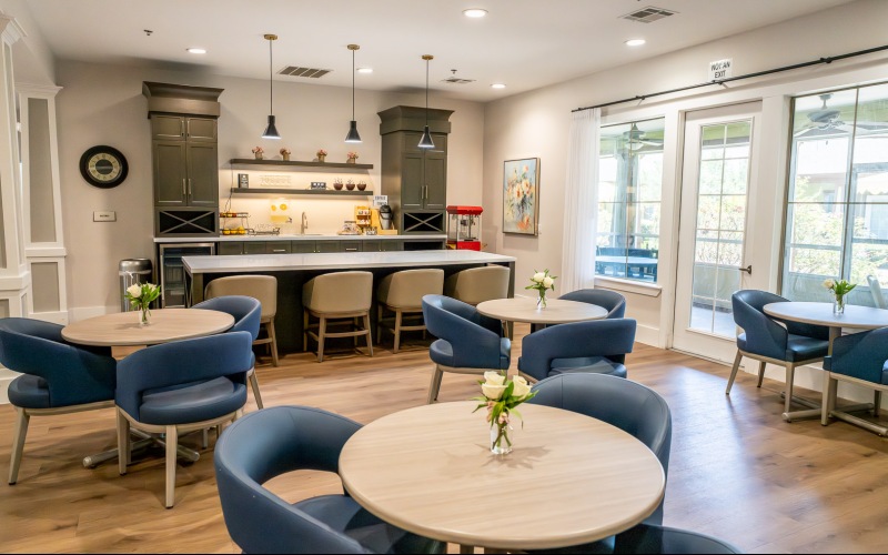 a large room with tables and chairs